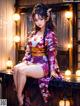 A woman in a kimono sitting on a table with lanterns.