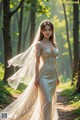 A woman in a wedding dress walking down a path in the woods.